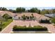 Beautiful home with red brick driveway, well-manicured landscaping, and a charming water fountain at 5950 Masters Blvd, Orlando, FL 32819