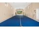 Spacious game room featuring a tennis net with high ceilings, recessed lighting, and neutral walls at 5950 Masters Blvd, Orlando, FL 32819