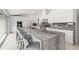 Open kitchen with large island, granite countertops, stainless steel appliances, and bar stool seating at 5950 Masters Blvd, Orlando, FL 32819