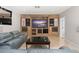 Spacious living room features a large TV, comfortable seating, and modern décor at 5950 Masters Blvd, Orlando, FL 32819