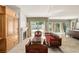 Bright main bedroom with fireplace, traditional furnishing, and tile flooring at 5950 Masters Blvd, Orlando, FL 32819