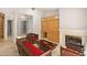 Main bedroom with fireplace and classic design, enhanced by neutral wall coloring at 5950 Masters Blvd, Orlando, FL 32819