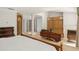 Large main bedroom with built in storage, fireplace, and tile flooring at 5950 Masters Blvd, Orlando, FL 32819