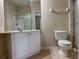 Bathroom with a single sink vanity, a toilet, and a shower at 6451 Old Park Ln # 302, Orlando, FL 32835
