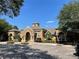 Community clubhouse with manicured landscaping and accessible parking at 6451 Old Park Ln # 302, Orlando, FL 32835