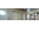Interior hallway with modern elevators, ensuring easy access to all floors of the building at 6451 Old Park Ln # 302, Orlando, FL 32835