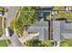 An aerial view of the home displaying the yard, driveway and roof at 7325 Burnway Dr, Orlando, FL 32819