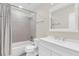 Bathroom featuring a shower and tub combination with a white sink and a mirrored medicine cabinet at 7325 Burnway Dr, Orlando, FL 32819