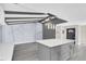 Bright modern kitchen with a large island and stainless steel appliances at 7325 Burnway Dr, Orlando, FL 32819