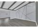 Open-concept living area features modern geometric wall art, beautiful floors, and a bright airy feel at 7325 Burnway Dr, Orlando, FL 32819