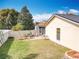 Expansive backyard featuring a well-maintained lawn and a comfortable patio space at 734 Adidas Rd, Winter Springs, FL 32708