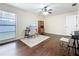 Spacious bedroom with hardwood floors, ceiling fan, and lots of natural light, great for home office at 734 Adidas Rd, Winter Springs, FL 32708