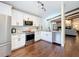 Beautiful kitchen with stainless appliances and granite countertops, open to the living and dining area at 734 Adidas Rd, Winter Springs, FL 32708