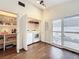Well-lit laundry room with modern appliances, storage shelves, and a view to the backyard at 734 Adidas Rd, Winter Springs, FL 32708