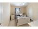 Cozy bedroom with carpeting, vaulted ceilings, and neutral paint at 877 Scrub Jay Way, Davenport, FL 33896