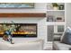 A modern gas fireplace features prominently within a bright living room at 900 Golfview St, Orlando, FL 32804