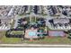 Aerial view of community amenities including pool, tennis court, playground, and well-maintained green spaces at 10078 Greenshire Way, Orlando, FL 32827