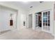 Hallway shows access to laundry, office, and other rooms in this carpeted home at 10078 Greenshire Way, Orlando, FL 32827