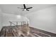 The bonus room features a sleek ceiling fan, spacious layout and modern finishes at 1070 Lake Ariana Blvd, Auburndale, FL 33823