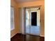 A large, open sliding glass door leads to the balcony, providing access to the outdoors at 1081 S Hiawassee Rd # 723, Orlando, FL 32835