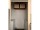 Convenient laundry room with washer and dryer connections and overhead cabinet at 1081 S Hiawassee Rd # 723, Orlando, FL 32835