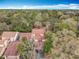 Beautiful aerial view of a home surrounded by lush greenery and mature trees at 117 Starling Ln, Longwood, FL 32779