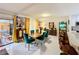 Inviting dining area with modern decor next to the kitchen and access to the outdoor living space at 117 Starling Ln, Longwood, FL 32779