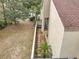 Aerial view of a home with a brick pathway and patio at 117 Starling Ln, Longwood, FL 32779