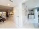 Open-concept kitchen with views of the living room with white cabinets and stainless appliances at 117 Starling Ln, Longwood, FL 32779