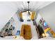 Open living room with high ceilings, exposed beams, and a sofa offering a cozy gathering space at 117 Starling Ln, Longwood, FL 32779