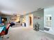 Spacious main bedroom featuring a ceiling fan, ensuite bathroom and walk-in closet at 117 Starling Ln, Longwood, FL 32779
