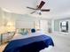 Large main bedroom with ceiling fan and closet access, providing ample storage and comfort at 117 Starling Ln, Longwood, FL 32779