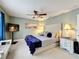 Serene main bedroom featuring a plush bed, accent pillows, and soft lighting creating a relaxing retreat at 117 Starling Ln, Longwood, FL 32779