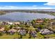 Beautiful lakefront houses nestled along the shore with private docks and scenic views at 12820 Butler Bay Ct, Windermere, FL 34786