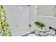 Modern bathroom with updated fixtures, plants and bright natural lighting at 1420 Continental Dr, Daytona Beach, FL 32117