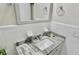 This is a bright bathroom with updated fixtures, and granite sink top at 1420 Continental Dr, Daytona Beach, FL 32117