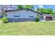 Charming single-story home with a well-manicured lawn and a two-car garage at 1420 Continental Dr, Daytona Beach, FL 32117