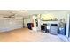 The spacious garage includes laundry area with washer, dryer, and utility sink at 1420 Continental Dr, Daytona Beach, FL 32117