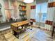 Stylish home office with modern desk, shelving, and decor, featuring a comfortable workspace at 145 Old Moss Cir, Deland, FL 32724