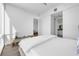 Serene bedroom boasts a spacious layout, comfortable bed, and tranquil atmosphere with modern decor at 150 E Robinson St # 2308, Orlando, FL 32801