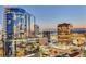 Gorgeous downtown skyline view with reflective glass buildings and illuminated city streets at twilight at 150 E Robinson St # 2308, Orlando, FL 32801