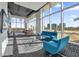 Bright common area with modern furniture, floor-to-ceiling windows, and city views at 150 E Robinson St # 2308, Orlando, FL 32801