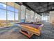 Game room featuring a pool table with floor-to-ceiling windows and city views at 150 E Robinson St # 2308, Orlando, FL 32801