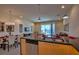 Open-concept living space connecting the kitchen, dining, and living areas for seamless entertaining at 1523 Still Dr, Clermont, FL 34714