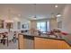 Open-concept living space connecting the kitchen, dining, and living areas for seamless entertaining at 1523 Still Dr, Clermont, FL 34714