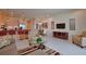 Spacious living area with an open floor plan connecting the kitchen, dining, and living room at 1523 Still Dr, Clermont, FL 34714