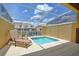 Private screened-in pool with lounge chairs, perfect for relaxation at 1523 Still Dr, Clermont, FL 34714