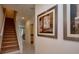 View of a carpeted staircase with white railing in a home's interior at 1523 Still Dr, Clermont, FL 34714