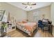 Bright bedroom with luxury vinyl plank flooring, and a ceiling fan at 1703 Leatherback Ln, St Cloud, FL 34771