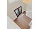 View of foyer from above with wood floors and chandelier at 1705 Ridgemoor Dr, Mascotte, FL 34753